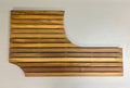 A curved teak wood bath mat displaying natural wood patterns and colors for Grech RV trailer